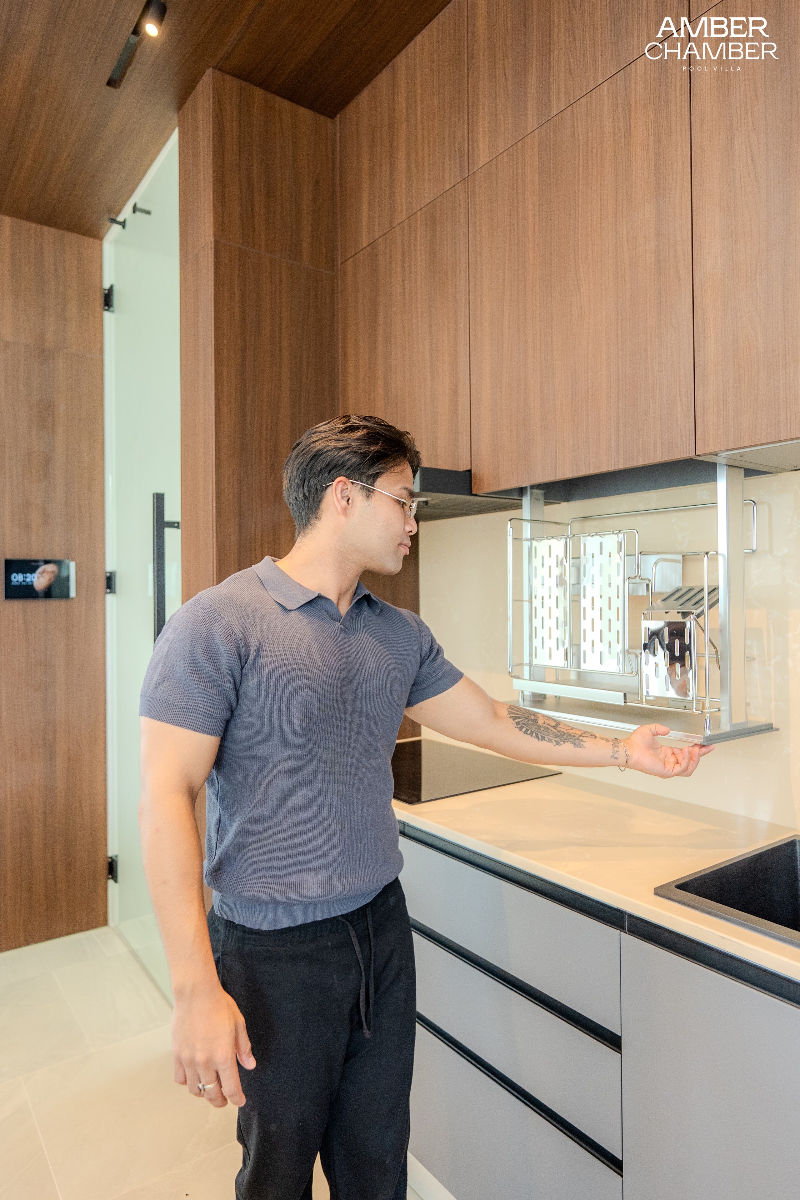 Amber Chamber villa kitchen with island seating and integrated appliances