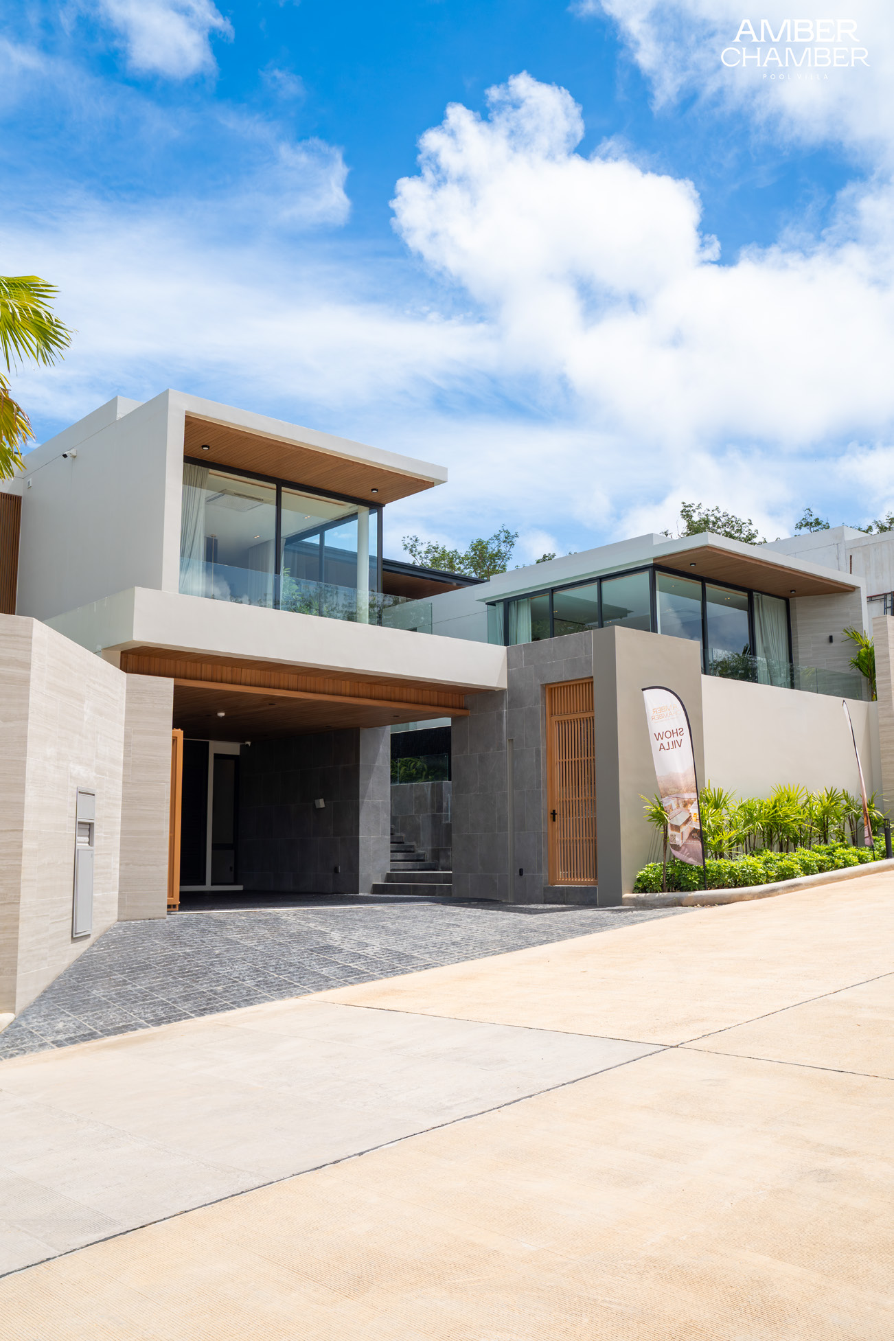 Contemporary white villa facade under a clear Phuket sky